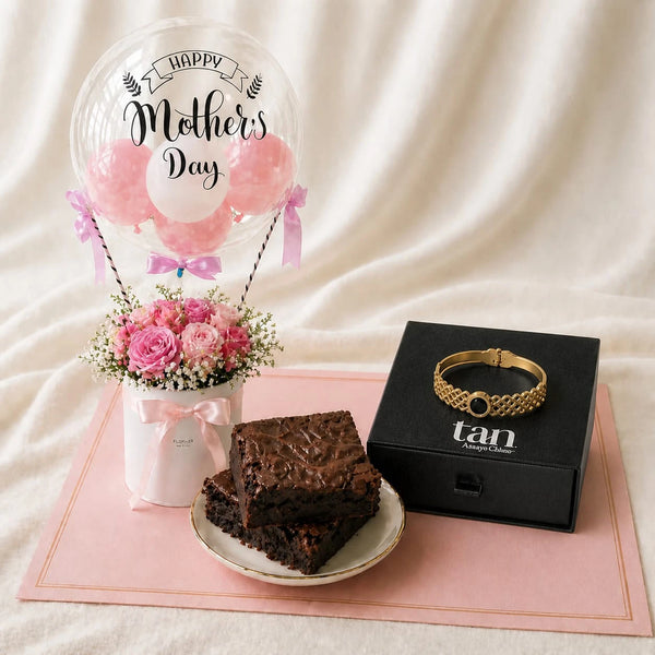 Mother's Day Gift Combination featuring a Flower arrangement, a women's cuff bracelet, and brownies.