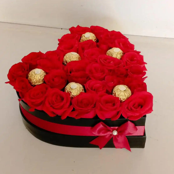 heart-shaped gift box of fresh red roses and Ferrero Rocher chocolates - Real Flowers Pakistan