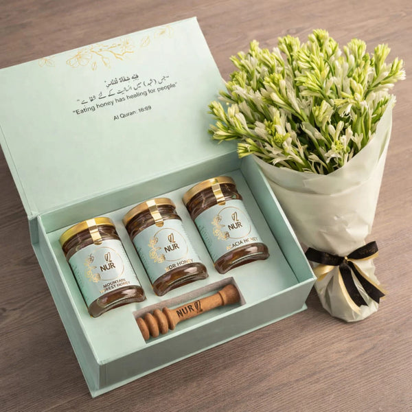 A Gift combination set with three pure honey jars and a bouquet of Fresh tuberose flowers - Real Flowers Pakistan