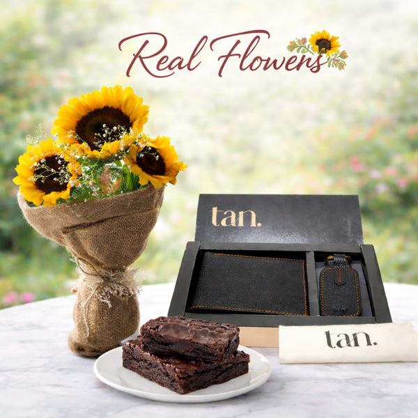 A gift combo of a hand-tied bouquet of sunflowers, brownies, and a 'tan.' branded wallet gift set with Delivery in Pakistan