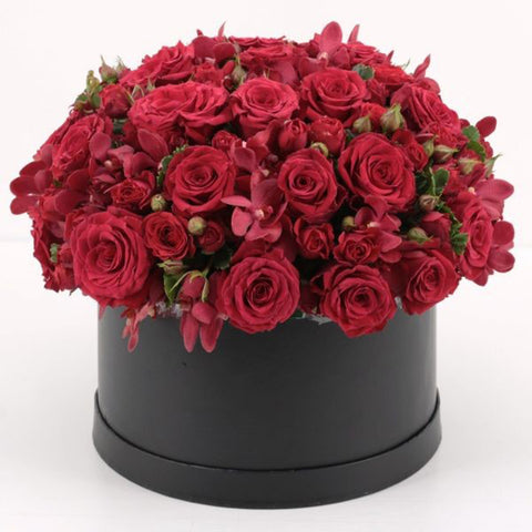 red roses and premium quality chrysanthemums in a gift box - Real Flowers Pakistan