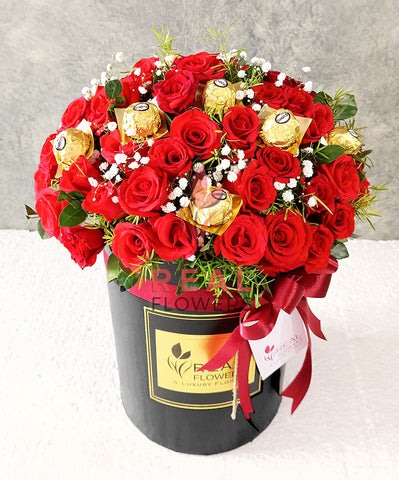 Red Roses and chocolates box - Real Flowers Pakistan